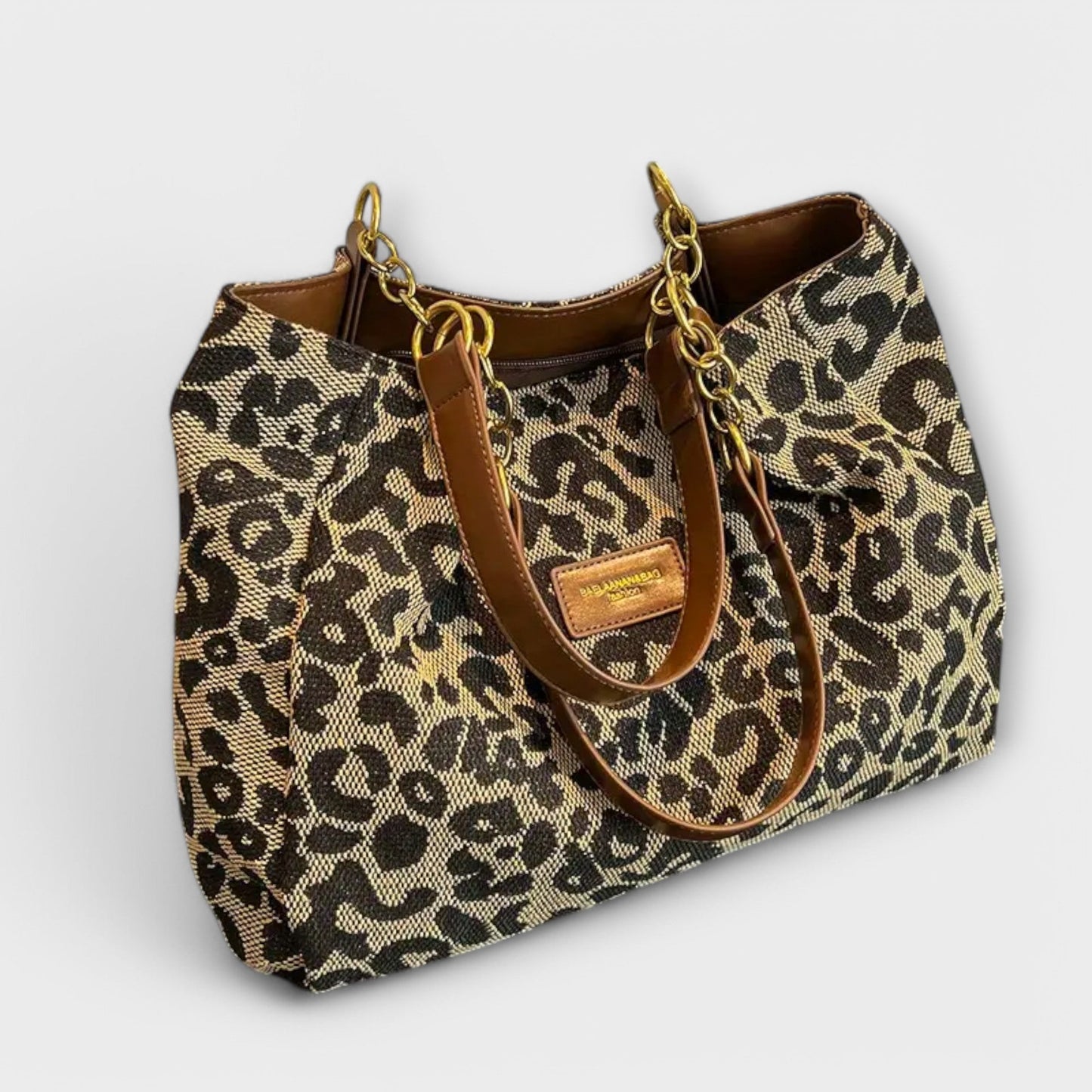 Rita. – Bolso tote de lona con estampado de leopardo