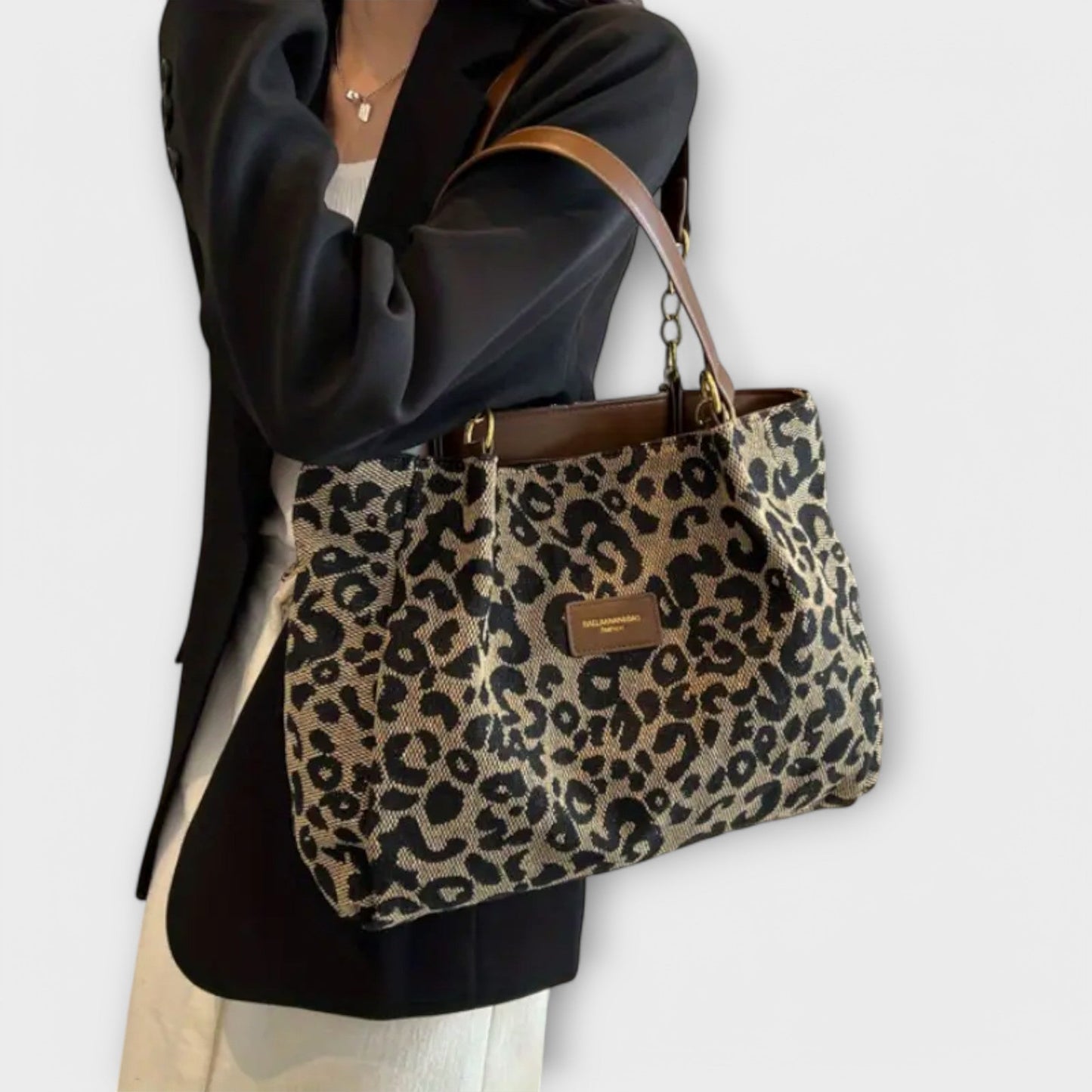 Rita. – Bolso tote de lona con estampado de leopardo