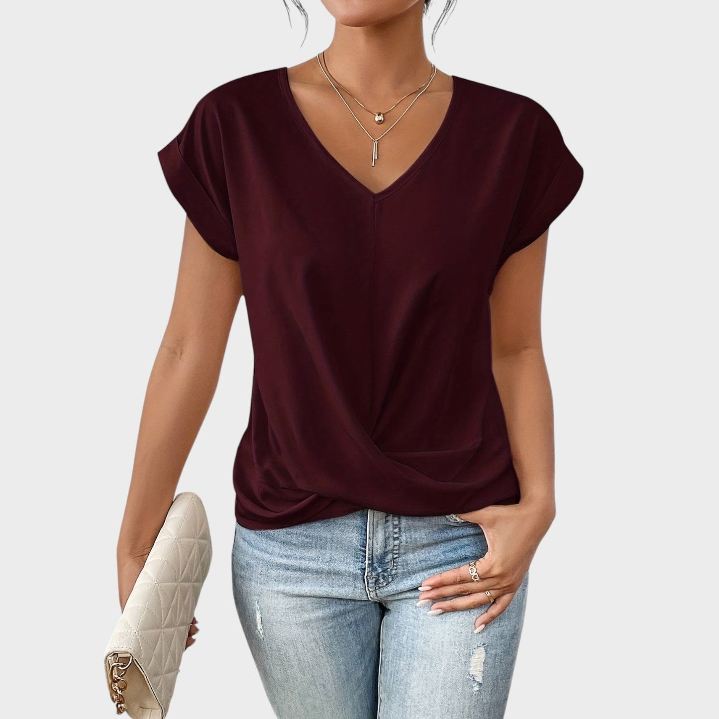 Eloise | Blusa con escote en V y detalle de nudo