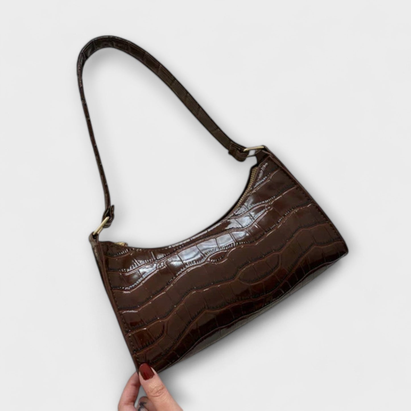 Rita. – Bolso de cuero brillante