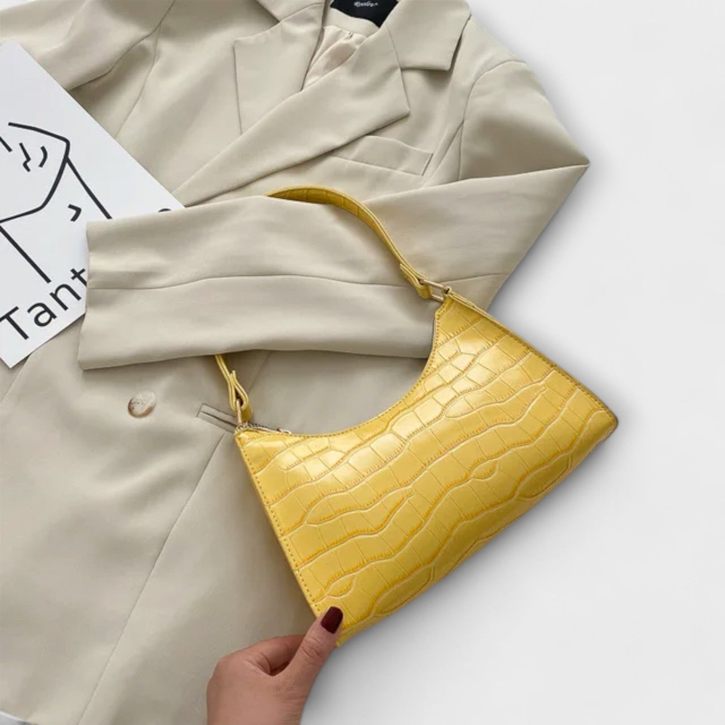 Rita. – Bolso de cuero brillante