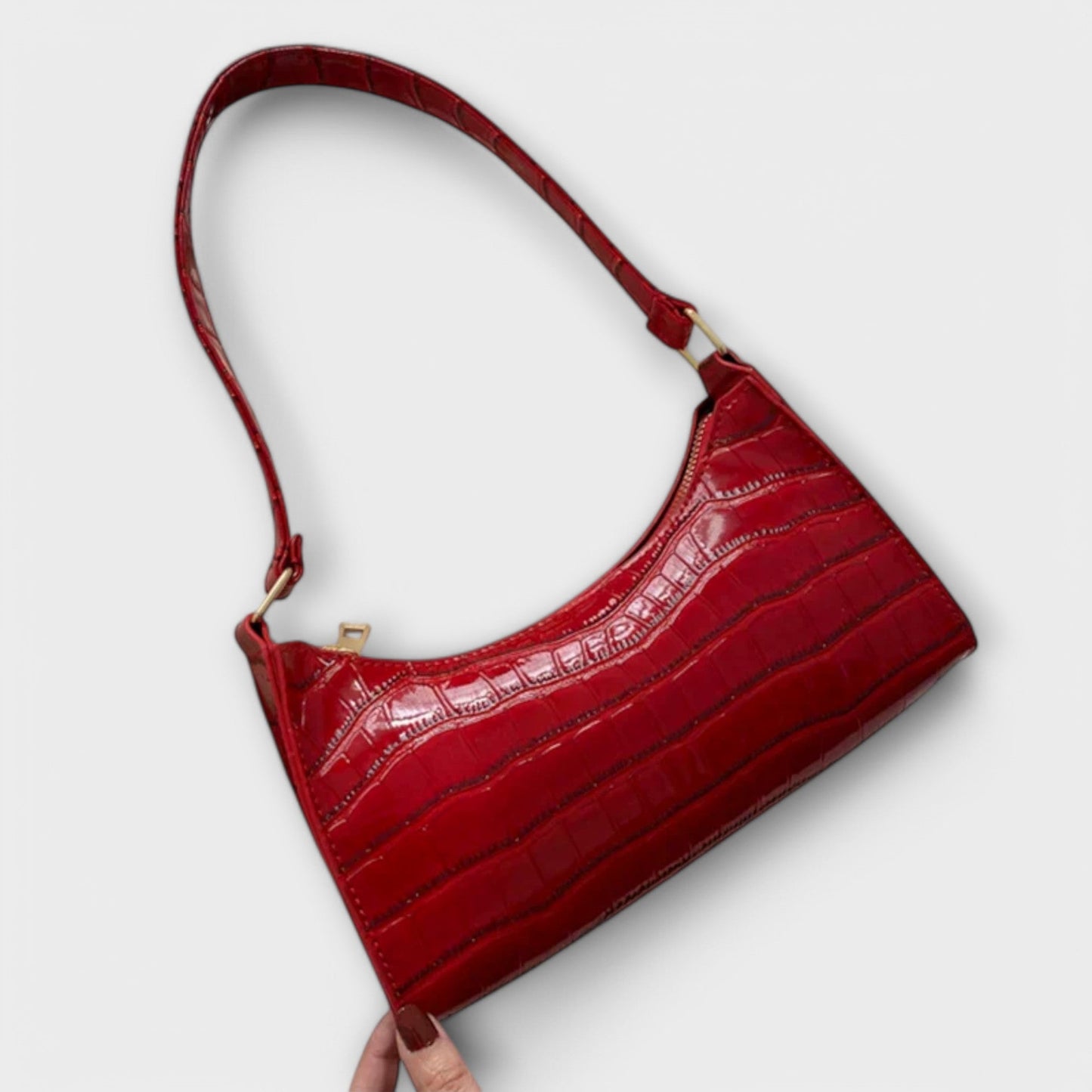 Rita. – Bolso de cuero brillante