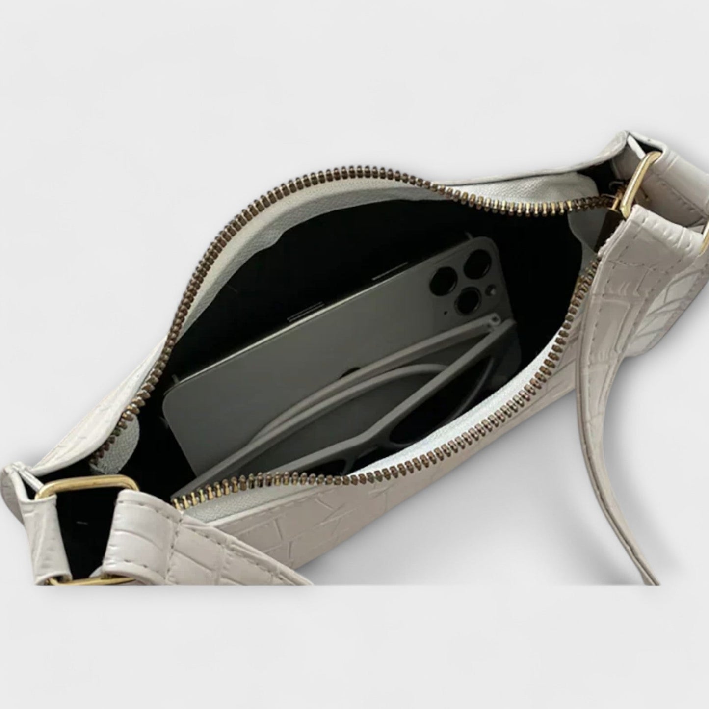 Rita. – Bolso de cuero brillante