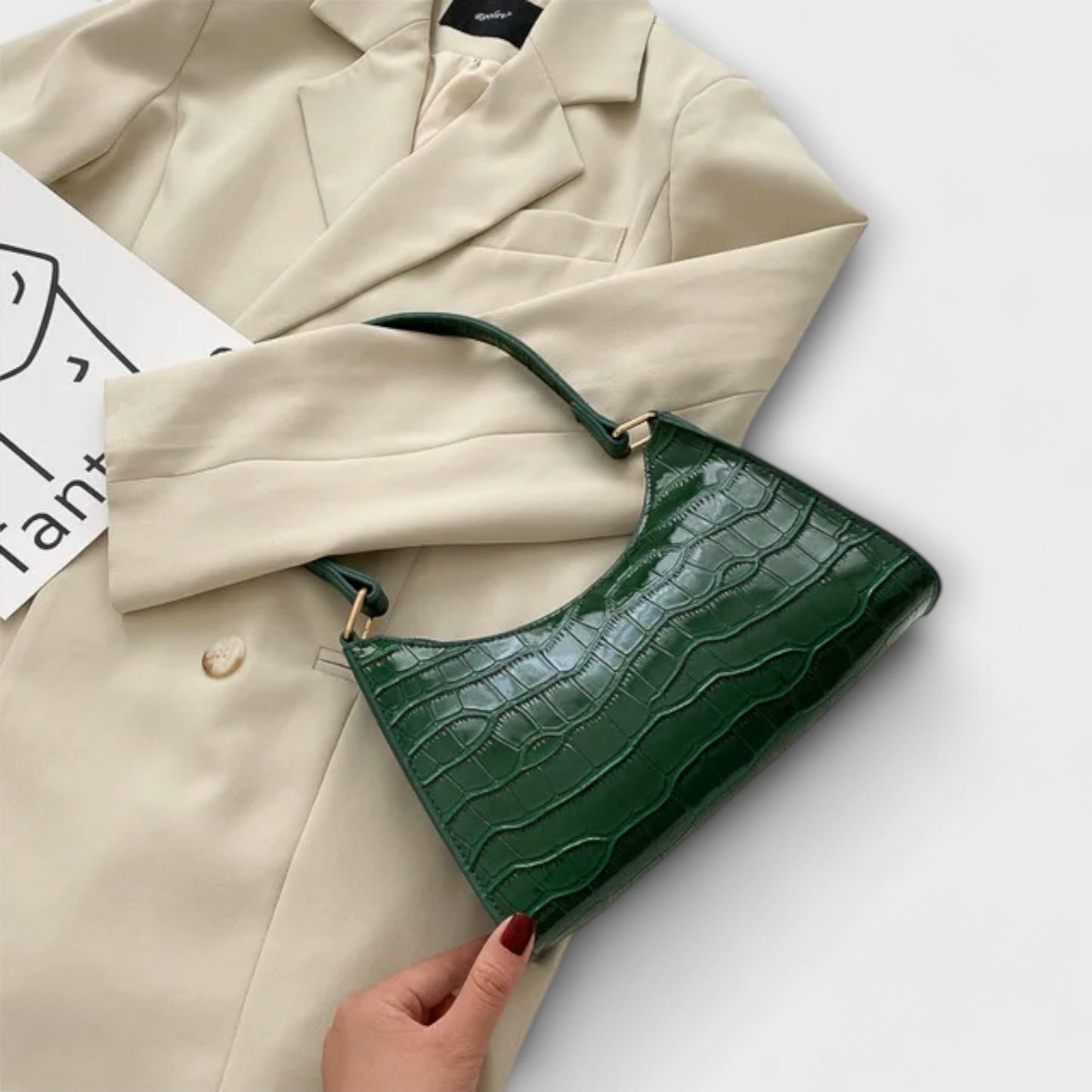 Rita. – Bolso de cuero brillante