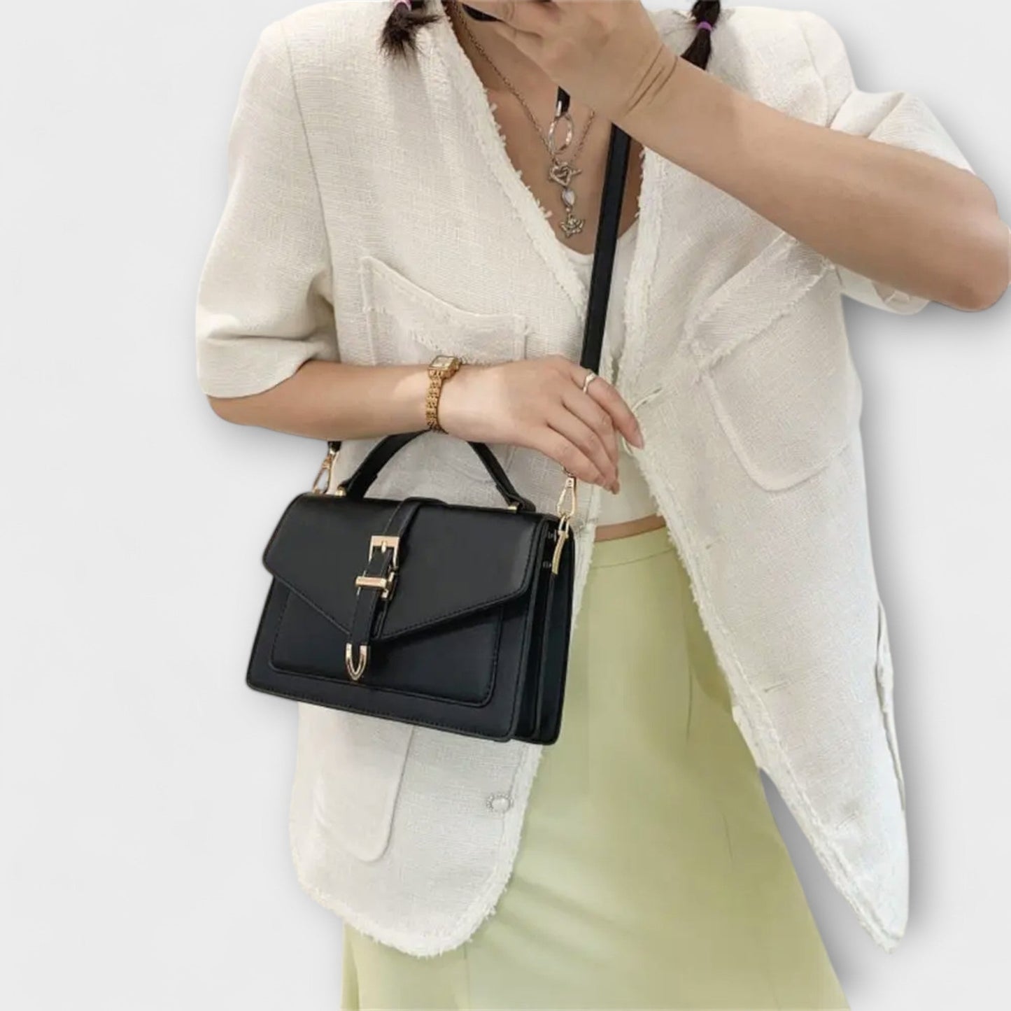 Rita. – Bolso de hombro clásico