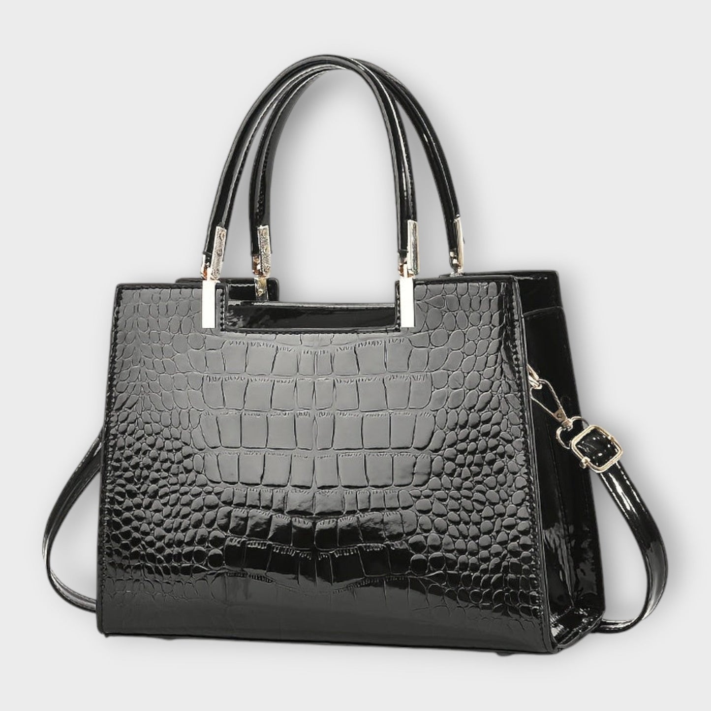 Rita. – Bolso de mano efecto cocodrilo brillante