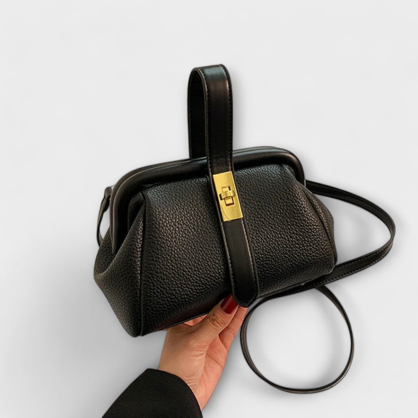 Rita. – Bolso retro