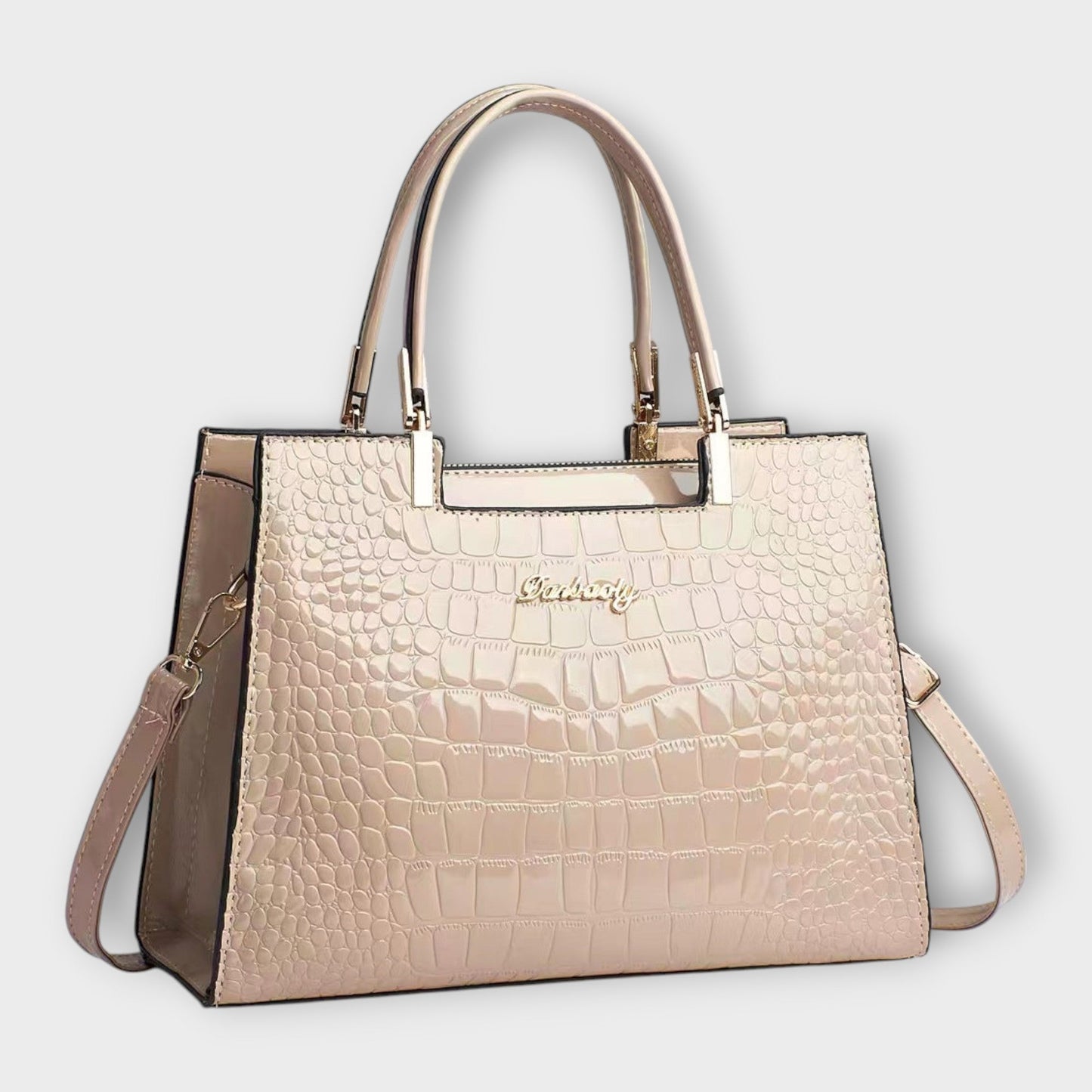 Rita. – Bolso de mano efecto cocodrilo brillante
