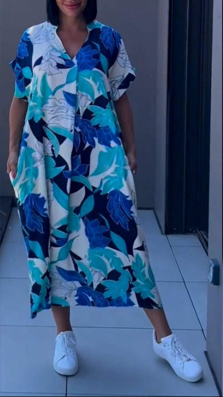 Nia | Vestido midi con estampado floral y escote en V