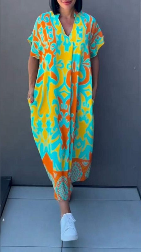 Nia | Vestido midi con estampado floral y escote en V