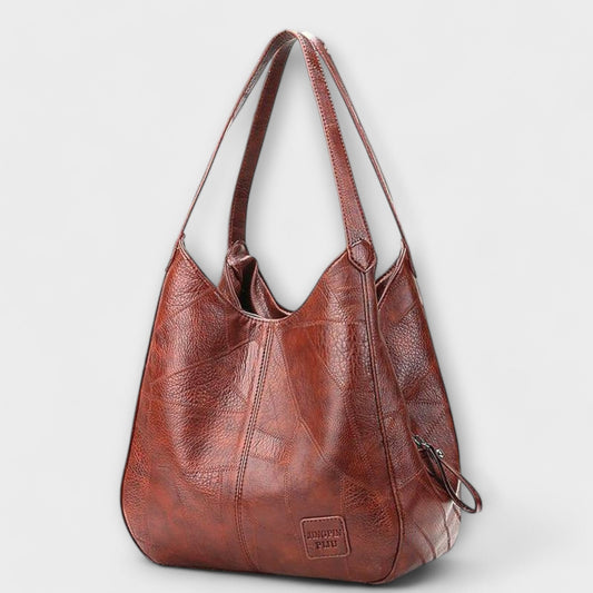 Rita. – Bolso de cuero vintage