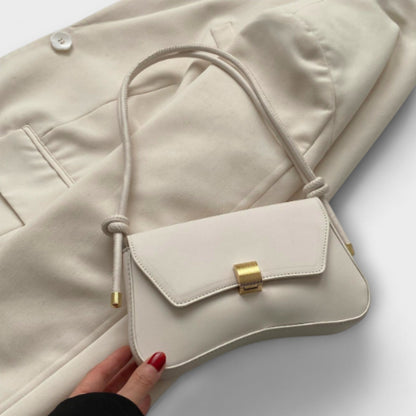 Rita. – Bolso vintage con solapa