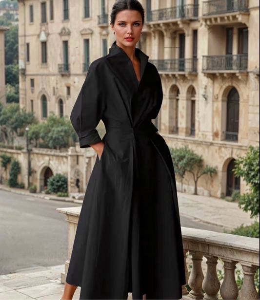 Vestido midi elegante de línea amplia con cuello alto y mangas tres cuartos