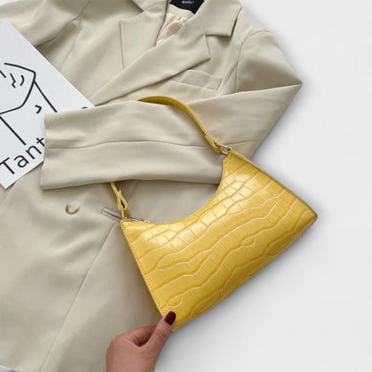 Rita. – Bolso de cuero brillante