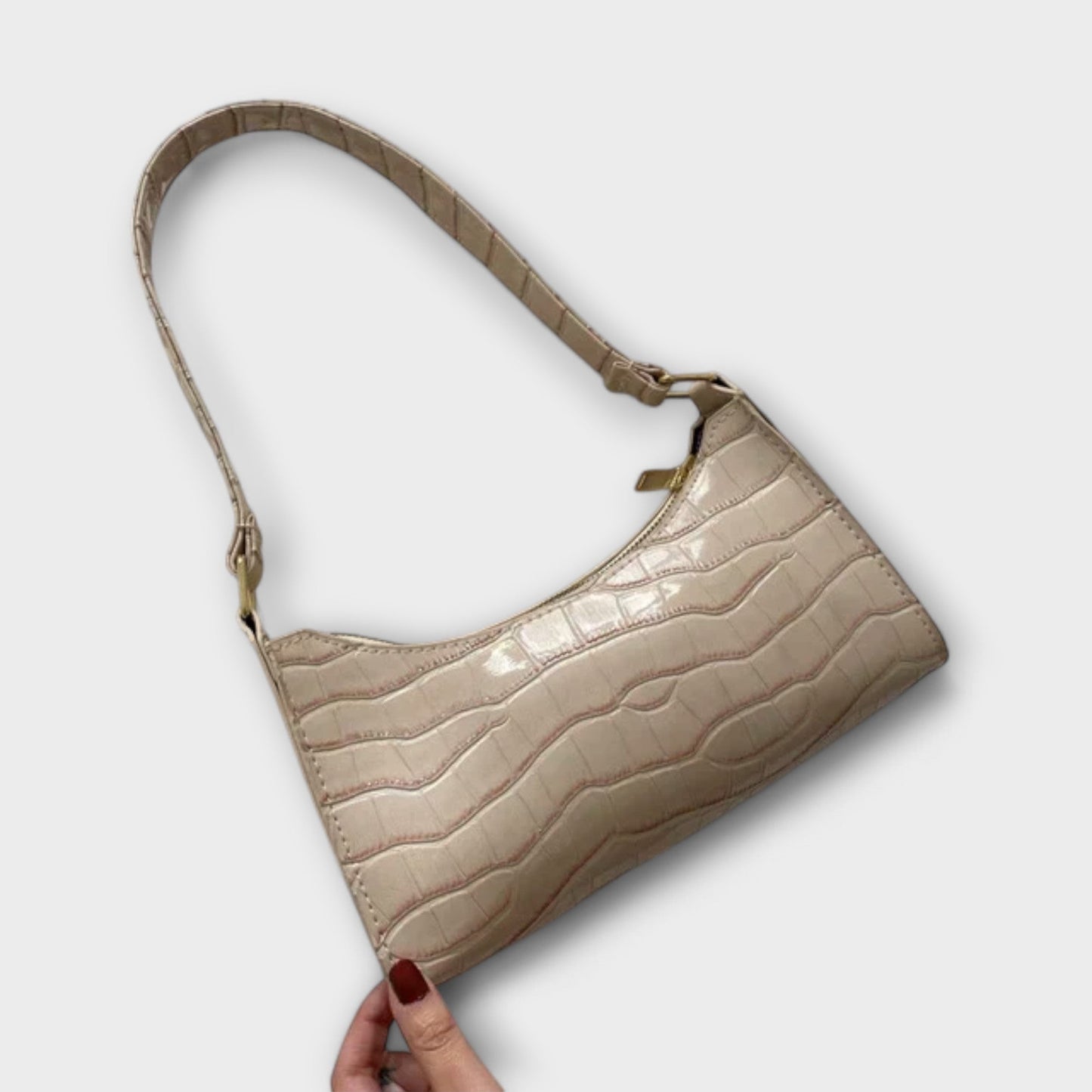 Rita. – Bolso de cuero brillante