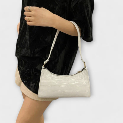 Rita. – Bolso de cuero brillante