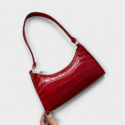 Rita. – Bolso de cuero brillante