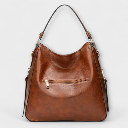 Rita. – Bolso grande