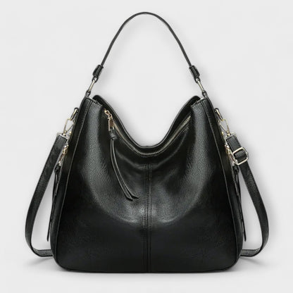 Rita. – Bolso grande