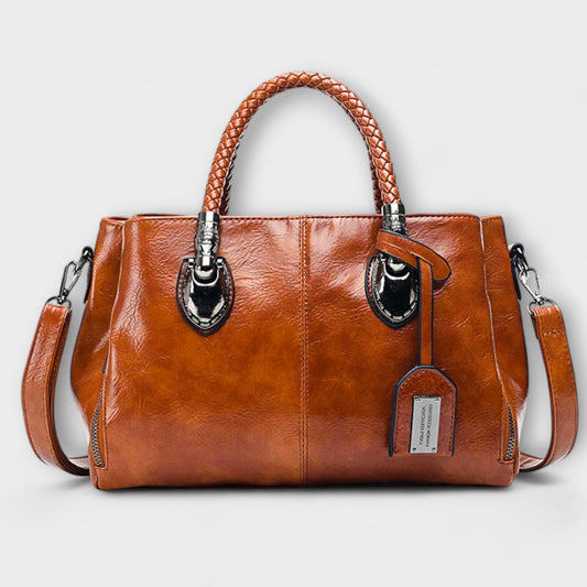 Rita. – Bolso tipo duffel elegante