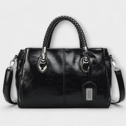 Rita. – Bolso tipo duffel elegante