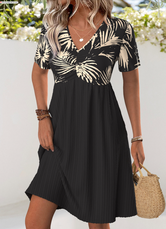 Vestido corto negro con escote en V y estampado de hojas