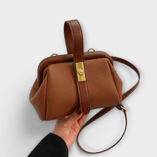 Rita. – Bolso retro