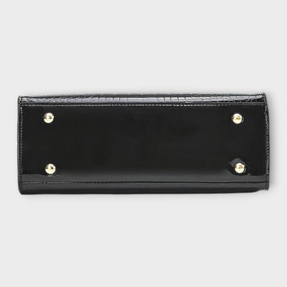 Rita. – Bolso de mano efecto cocodrilo brillante