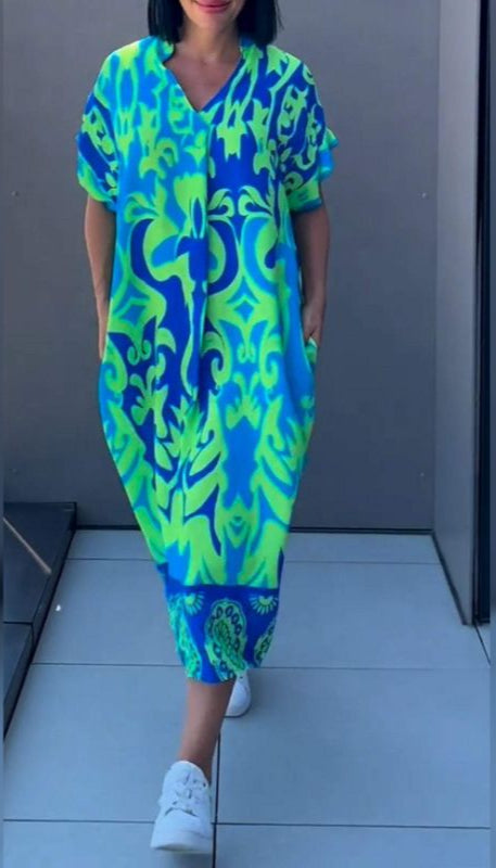 Nia | Vestido midi con estampado floral y escote en V